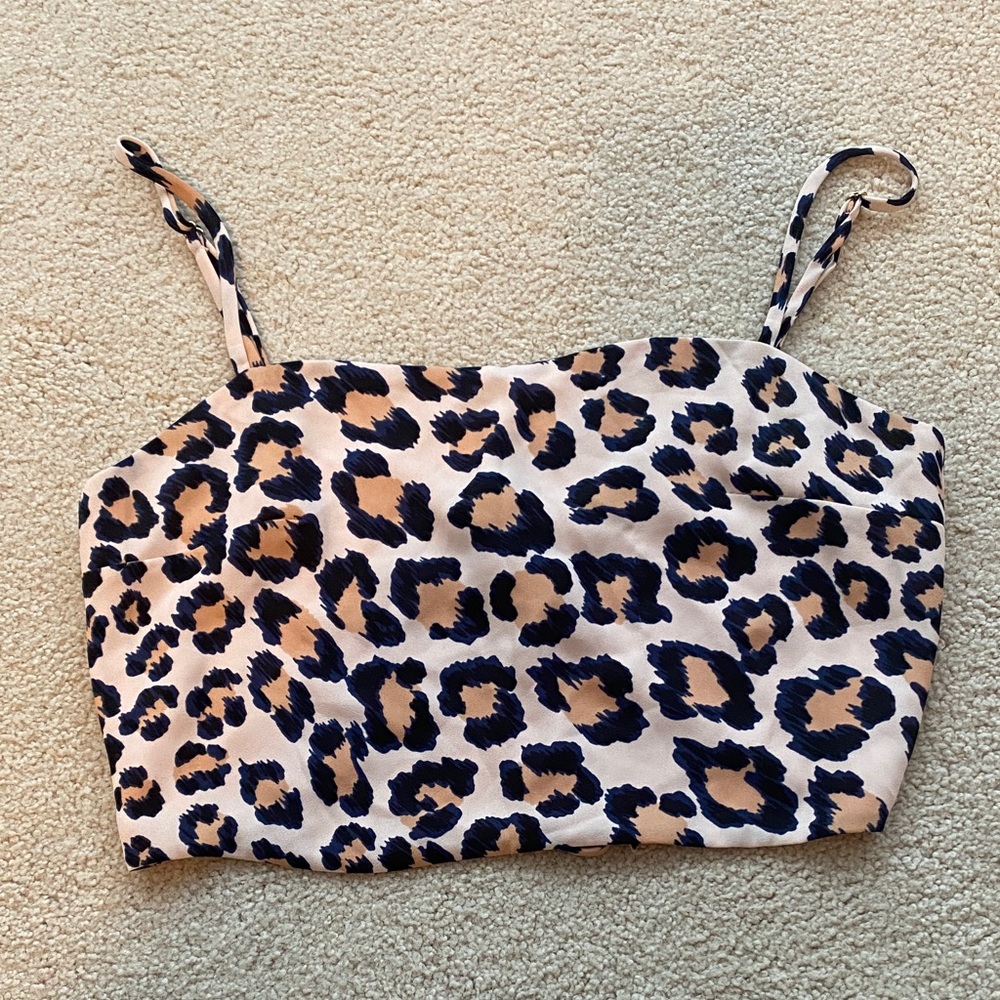 Victoria Secret animal print halter top. 
tie back & adjustable shoulder straps